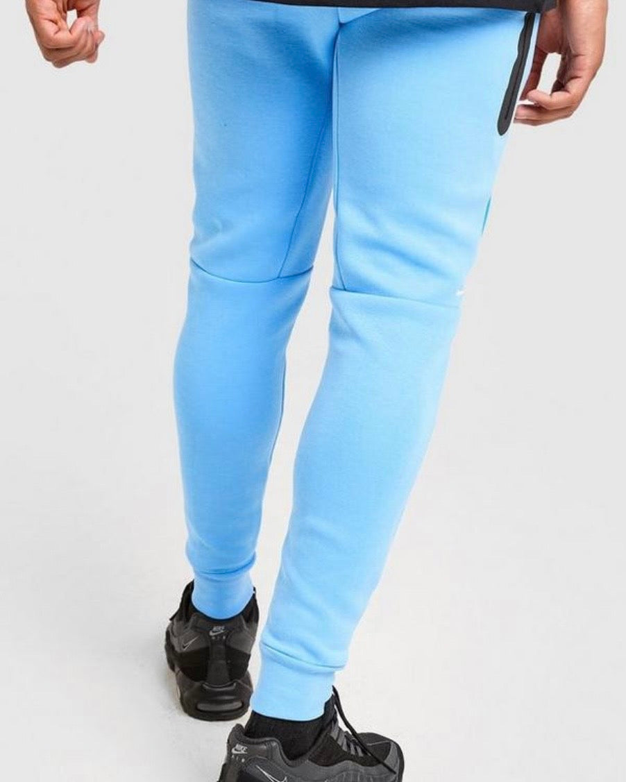 NIKE TECH FLEECE JOGGERS ‘UNIVERSITY BLUE LIGHT PHOTO BLUE’